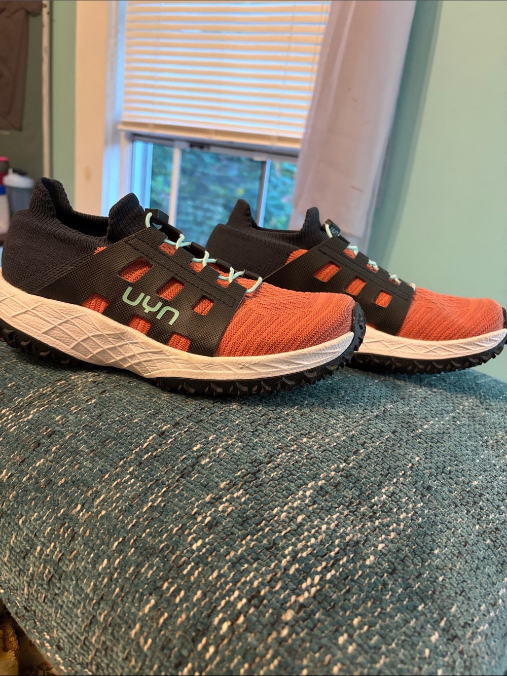 Uyn woman’s pull on sneakers, maroon, black.
